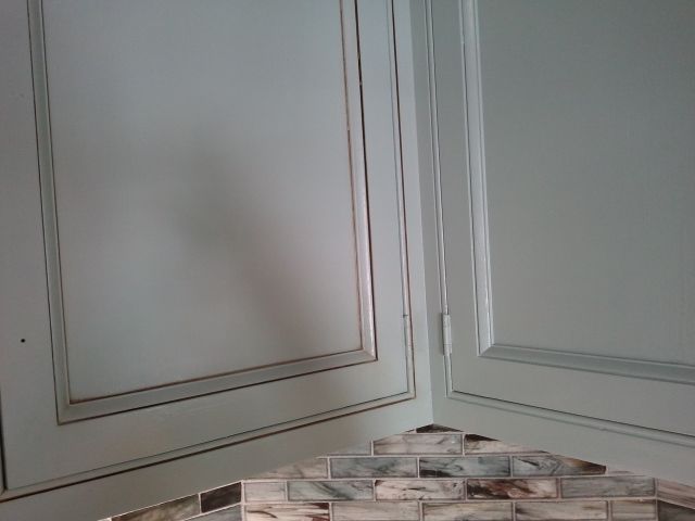 Painted and glazed cabinets.
Right side of photo h