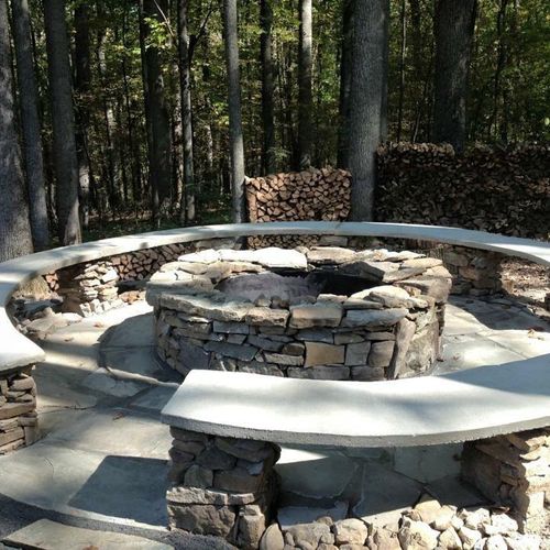 Custom stone fire pit with family seating 