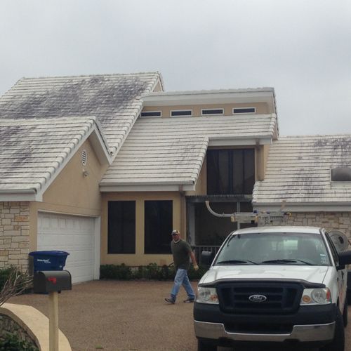 Soft wash roof cleaning
