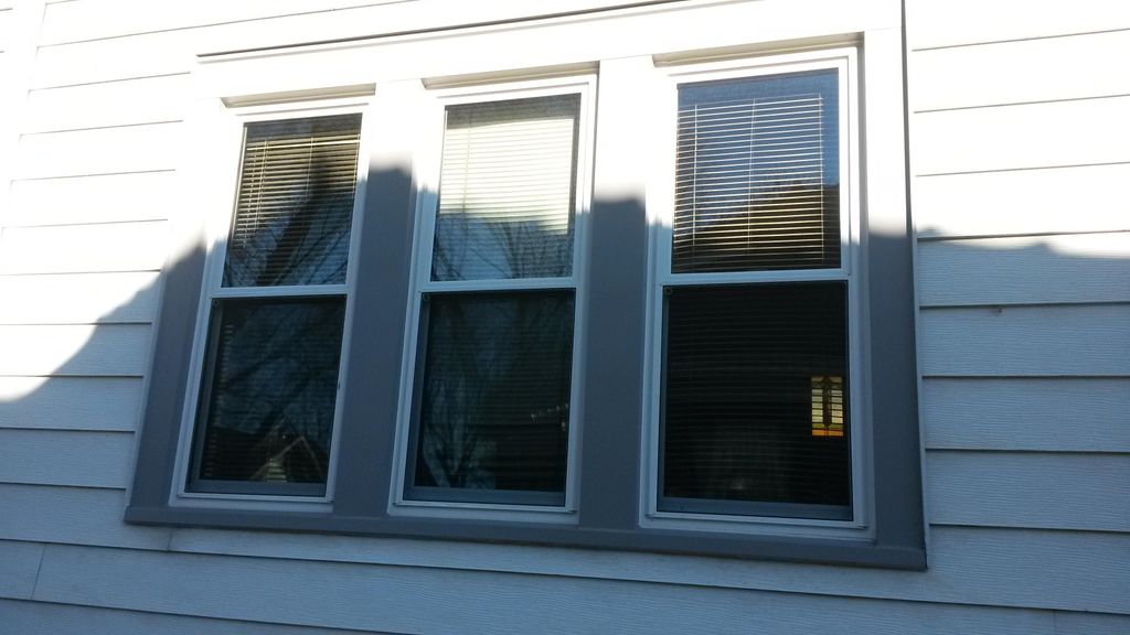 New vinyl windows and aluminum trim.