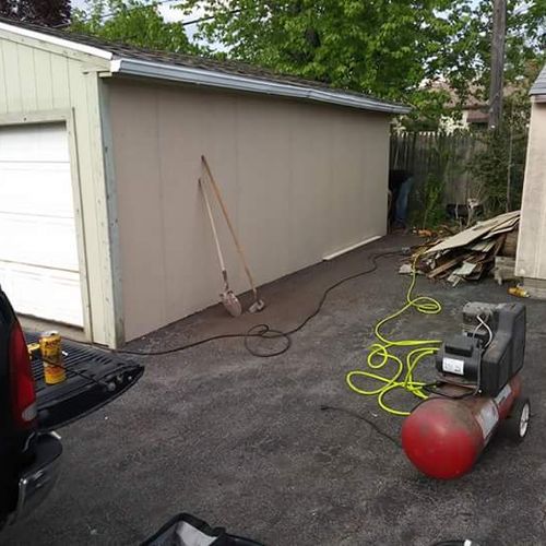 repaired a side of a garage