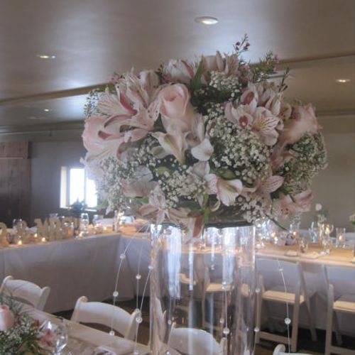 Tall vases with pastels, baby's breath, light pink