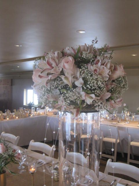 Tall vases with pastels, baby's breath, light pink