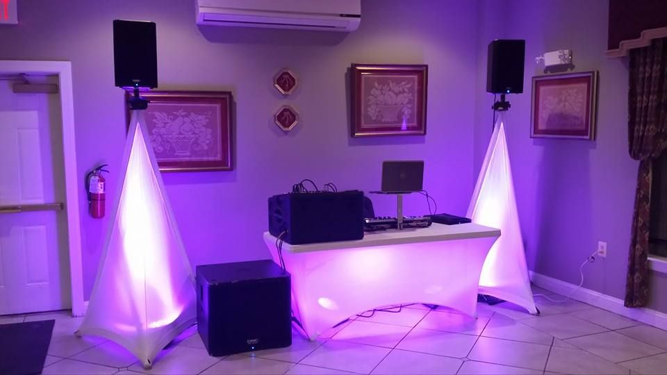 DJ setup scrim and special lighting