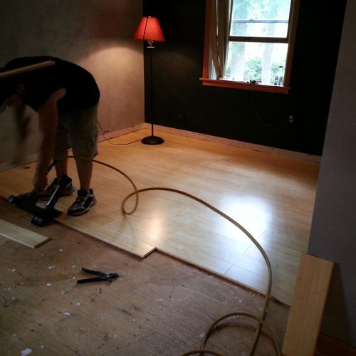Bamboo flooring being installed