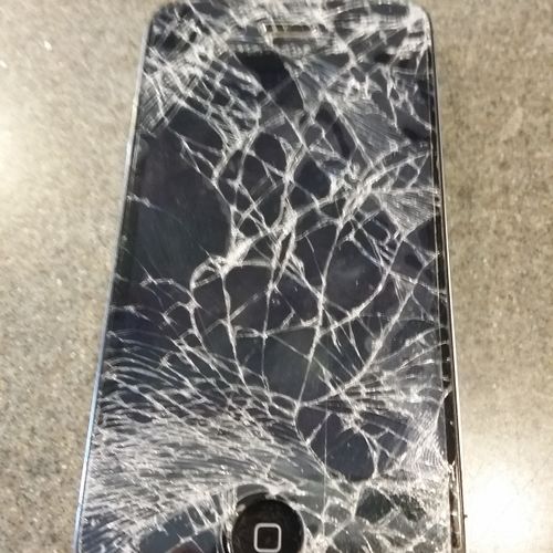 iPhone 4s Before. This device was thrown hard at a