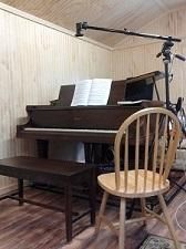 Studio with grand piano.