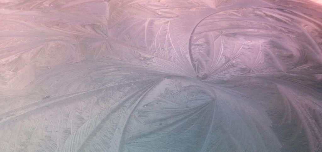 Frozen ice on a car windshield