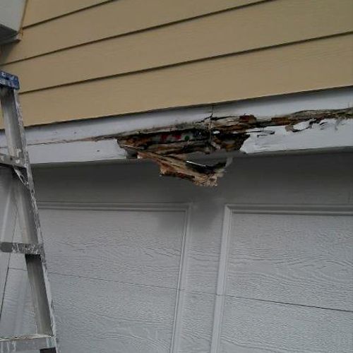 Garage door before repair