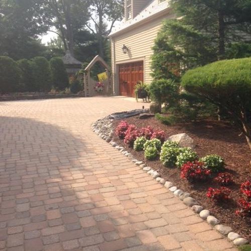 A finished paver driveway installed by Core.