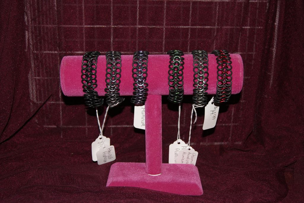 The bracelets are made with neoprene and anodized 