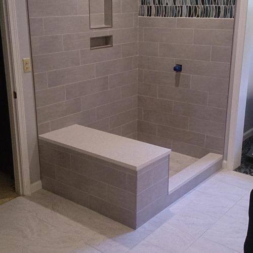 Custom shower with bench.