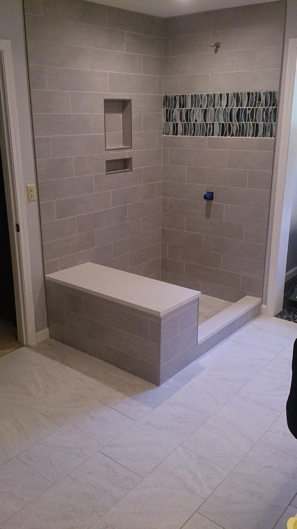 Custom shower with bench.