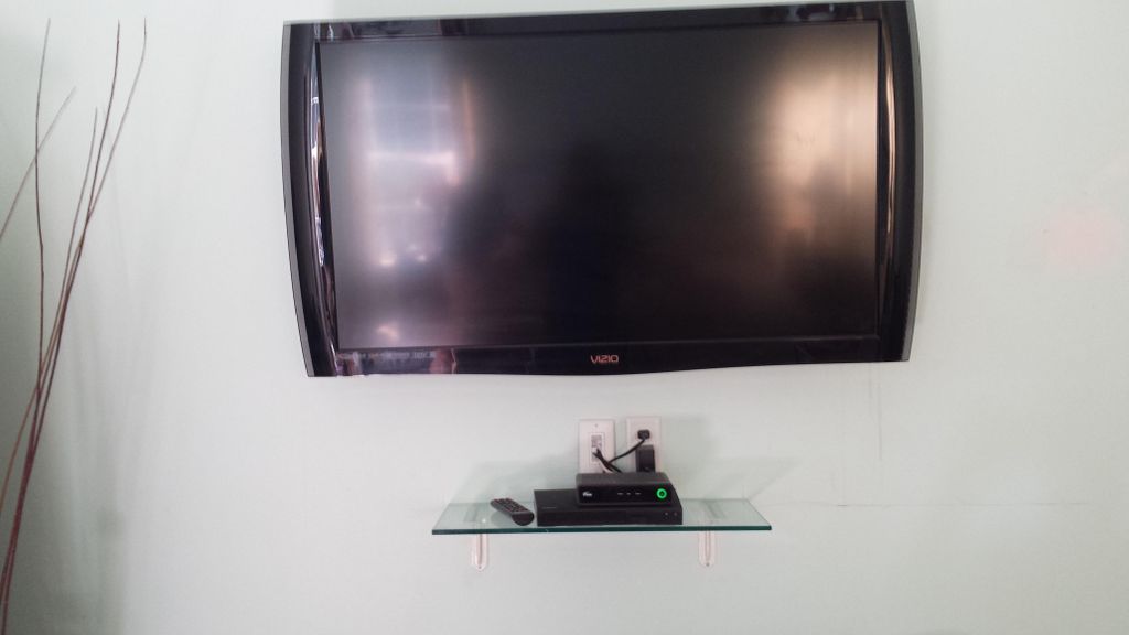 tv mount,added outlet behind tv and boxes for hdmi