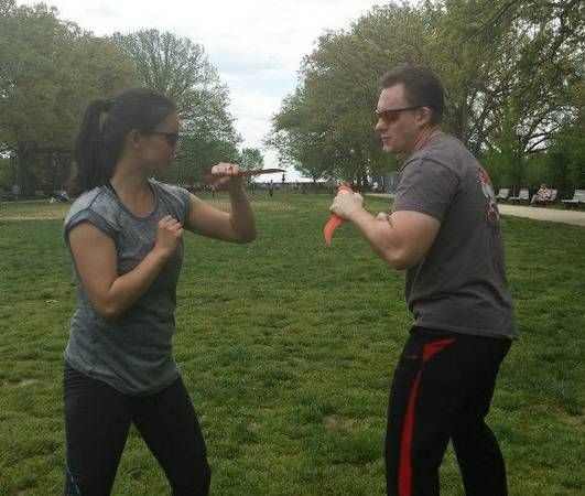 Student, Christine, practicing knife defense and t