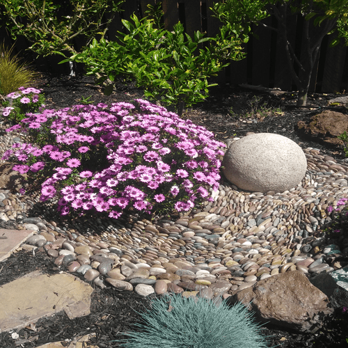 Artistically-styled creek bed channels water away 