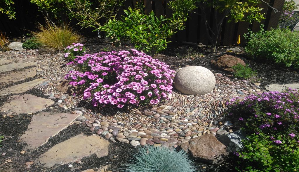 Artistically-styled creek bed channels water away 