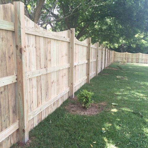 Scalloped privacy fence.