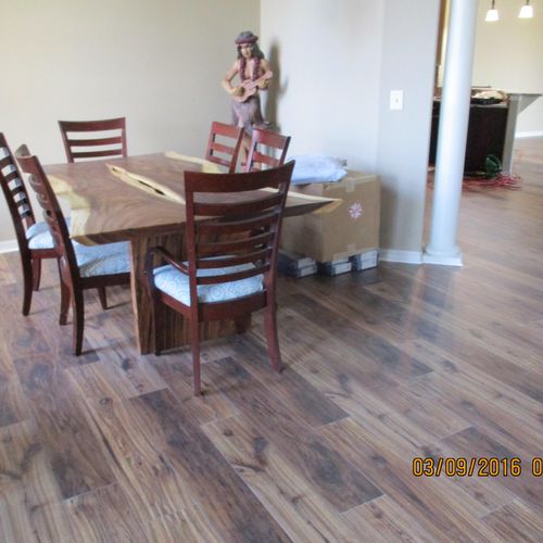 the dining area of a 1350 sq ft. laminate installa
