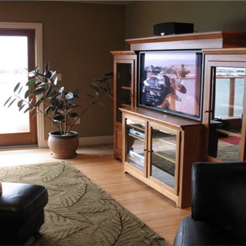 TV IN CABINET ON ARTICULATING ARM
San F