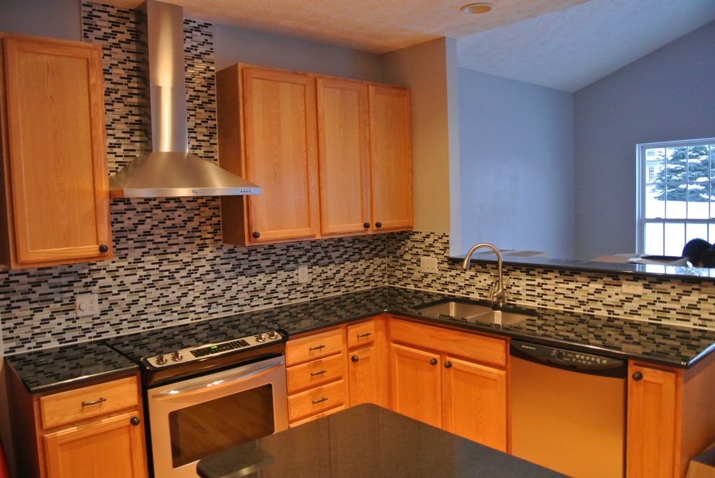 we redo this kitchen. new counter-top with range h