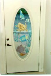 Carved tempered glass entry door that was airbrush