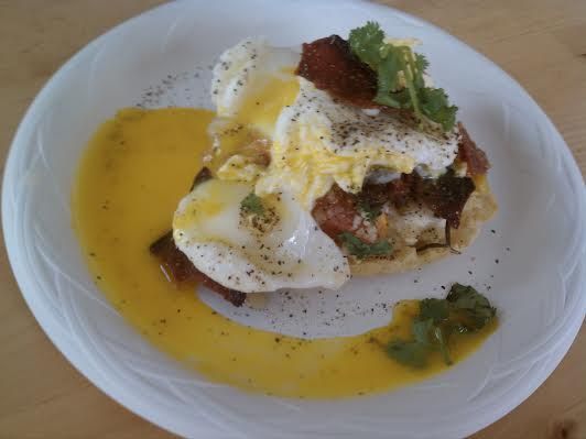 Eggs Benedict with maple bacon and poached egg sea