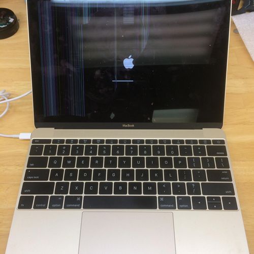 Apple MacBook with a broken LCD panel in for repai
