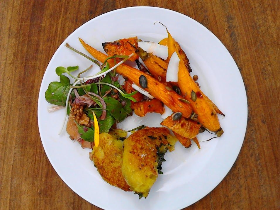 Nettle-stuffed potato cakes, whole roasted carrots