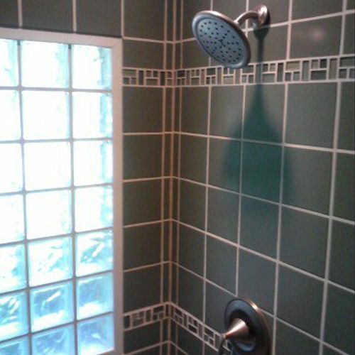 tiled shower with glass block window