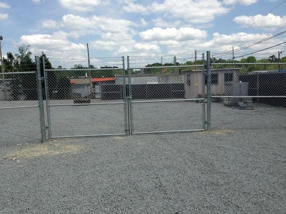 Chain link with barb wire