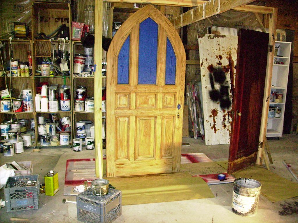 in shop refinish of customers front door 7'4"tall 