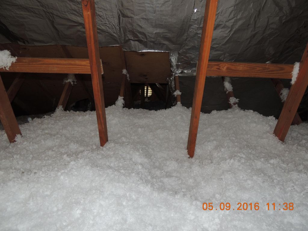 After the new fiberglass insulation was installed 