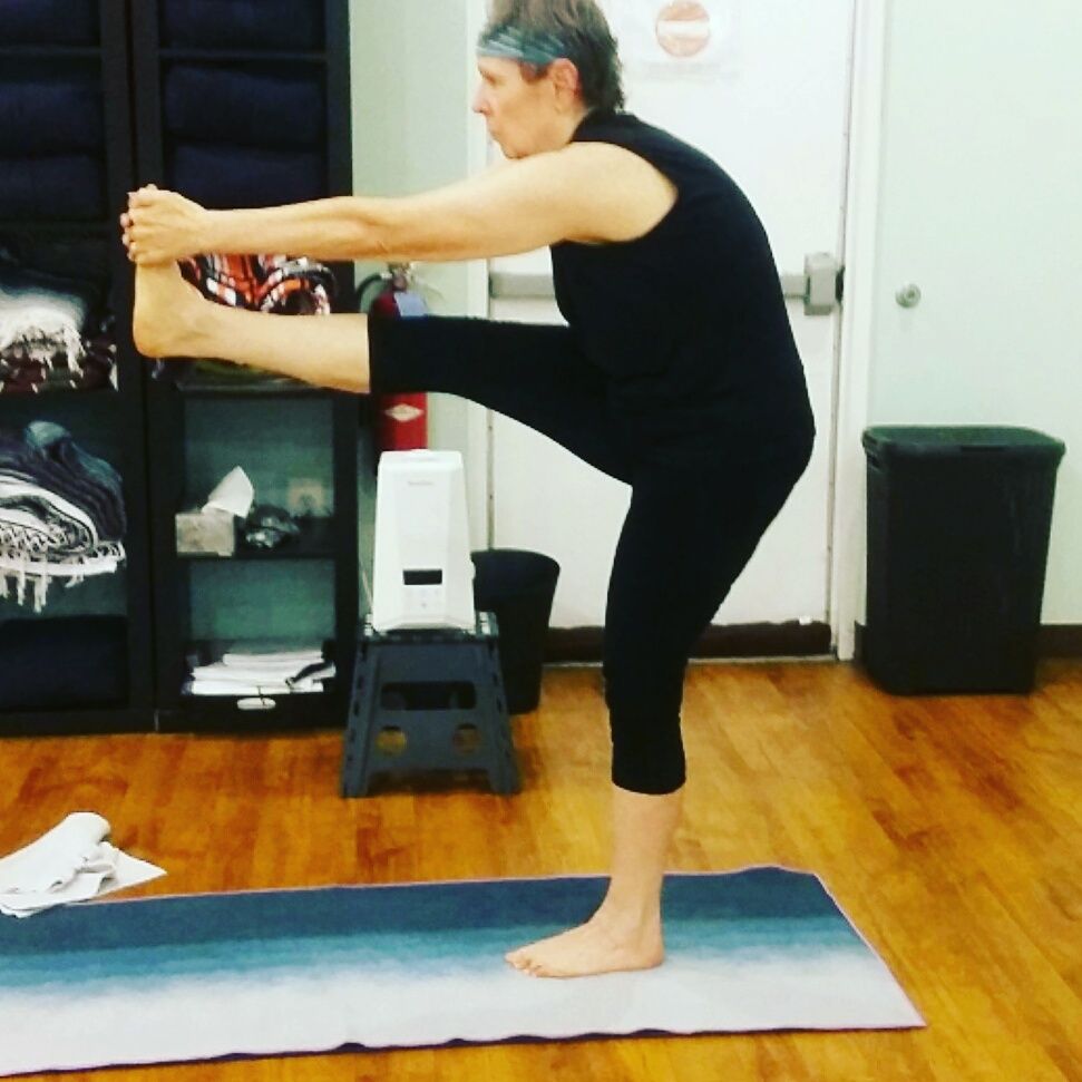 My student gwen in a in standing head to knee, she