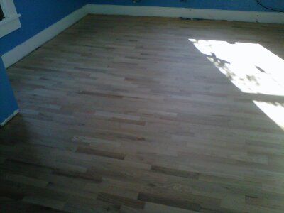 Hardwood with hole fixed and sanded