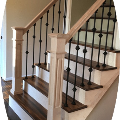 Custom staircase . solid iron balusters