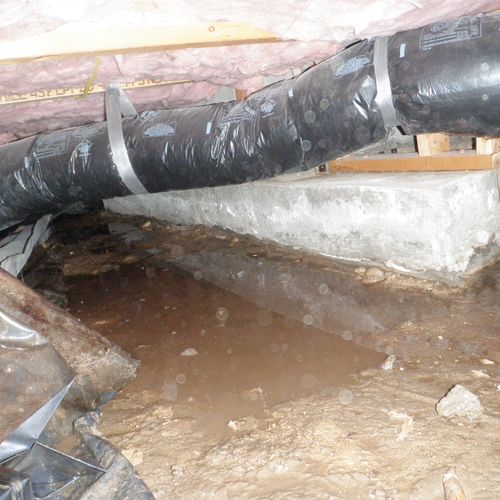Pump, Trench, and Waterproof Home Crawl Space