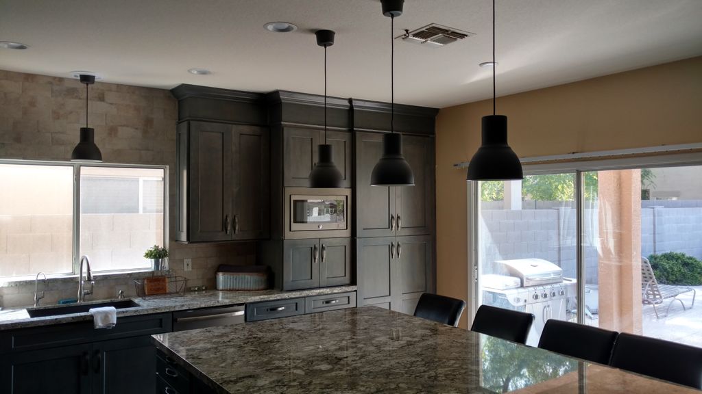 Added pendant lighting and 1 over sink