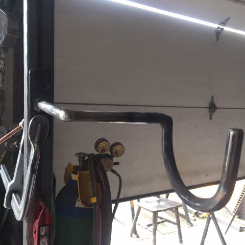 Hooks for garage to hang trimmer 