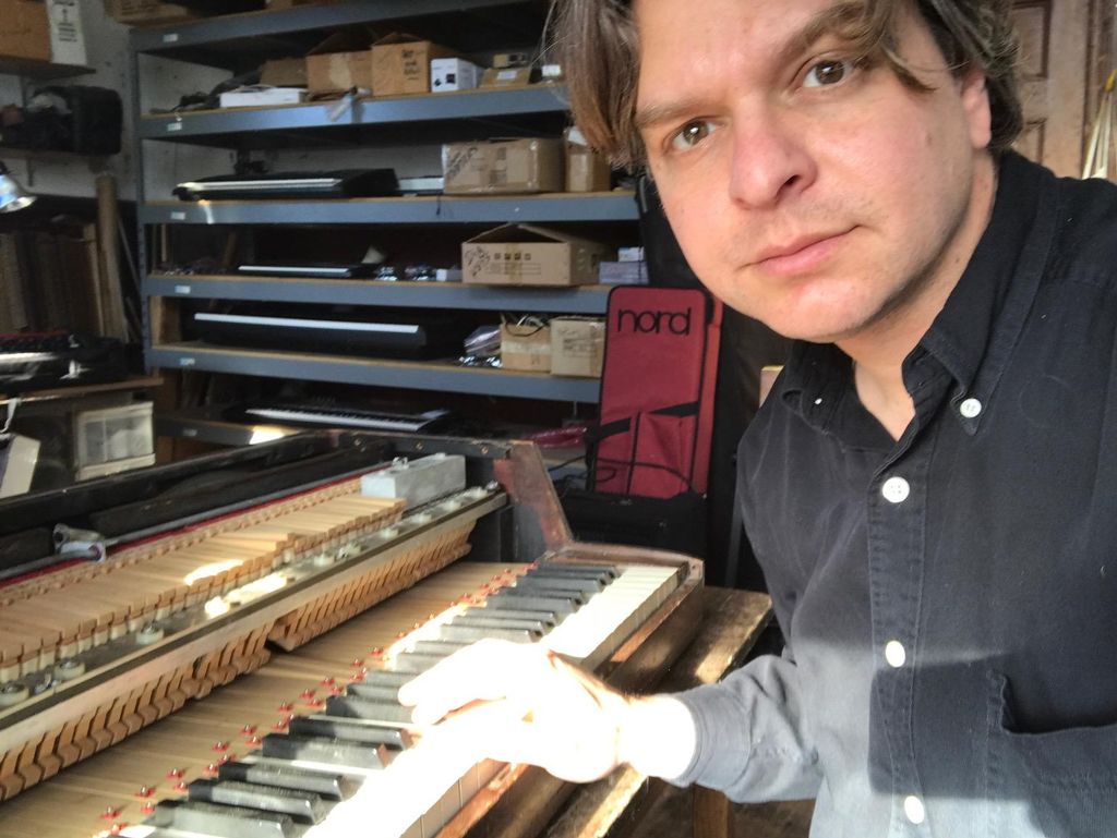 Hard at work on a 1950's wurlitzer electric piano