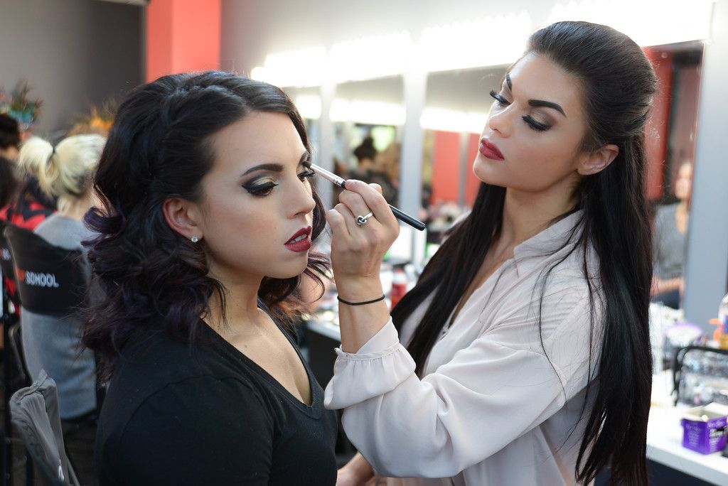 Doing makeup for portfolio at CMC makeup school