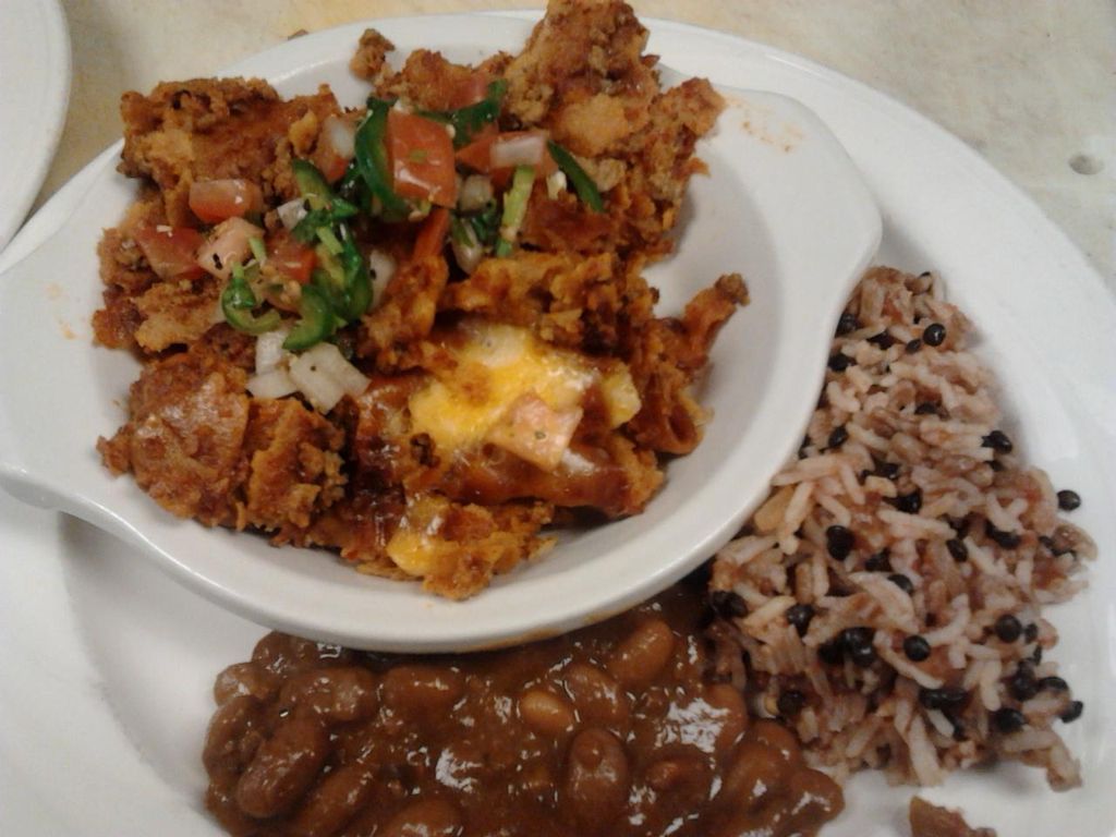 Enchiladas with refried beans and rice