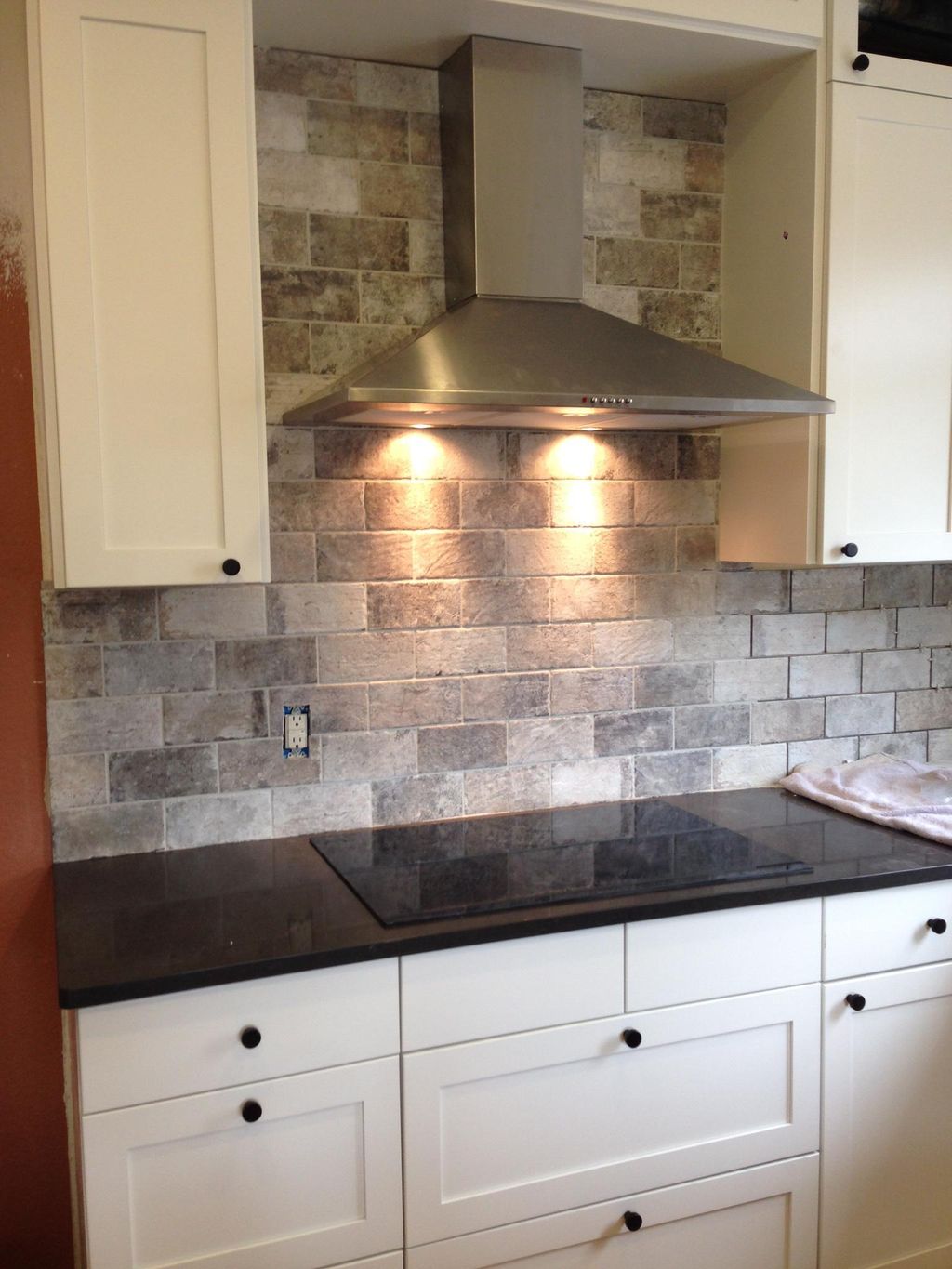 kitchens / stove tops / tile / cabinets