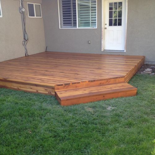 Redwood deck to replace rotten "trex deck" in East