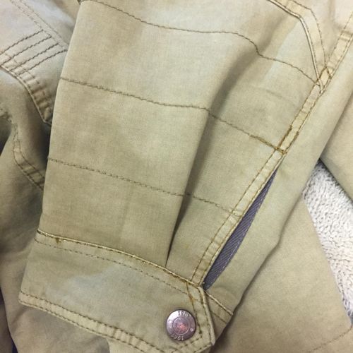 Jacket sleeves shortened & placket created.