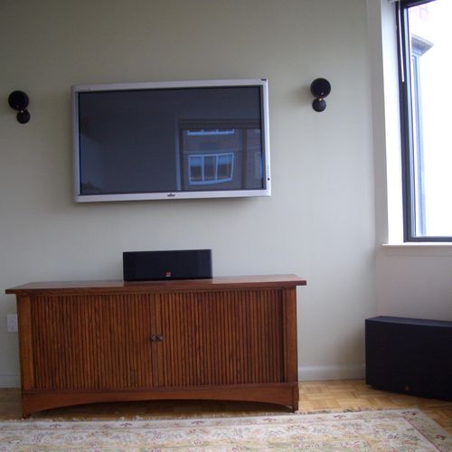 home theatre with hidden wires and equipment conso