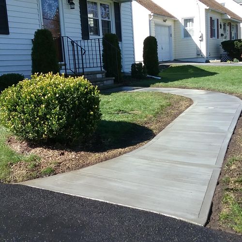 new concrete sidewalk finished