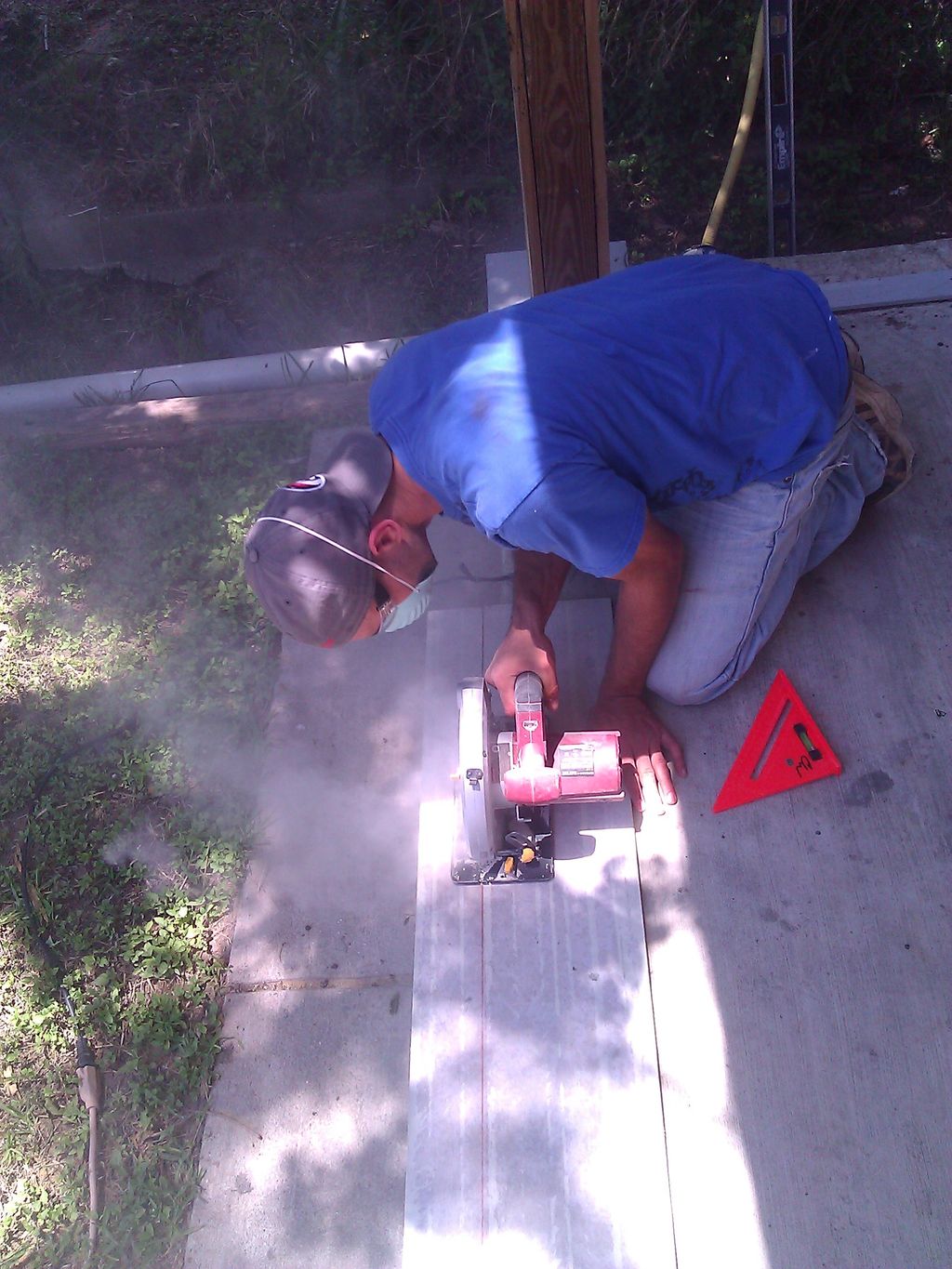 cutting up some hardi board on a siding job