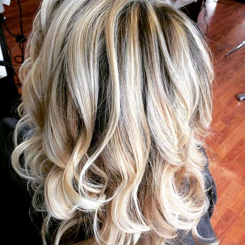 Highlighting technique called balayage. Curled wit