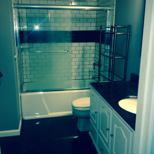 Bathroom. Granite tile/custom shower. Custom in sh
